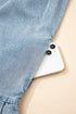 Charming Bow Tie Neck Sleeveless Ruffled Hem Chambray Mini Dress